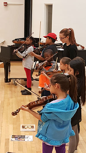 Students playing instruments
